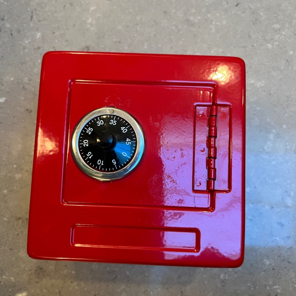 Kids table-top sized Safe! Holds all their “valuables” easy open combo! Fun red!